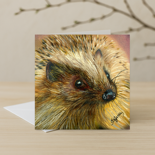 hedgehog card laying on a wooden surface