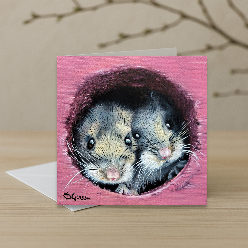 a card depicting two cute little mice 