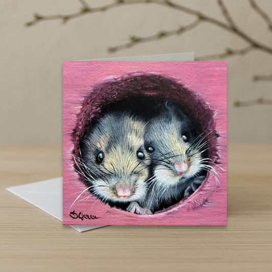 a card depicting two cute little mice 